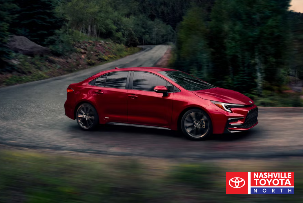 toyota corolla hybrid driving on a winding road