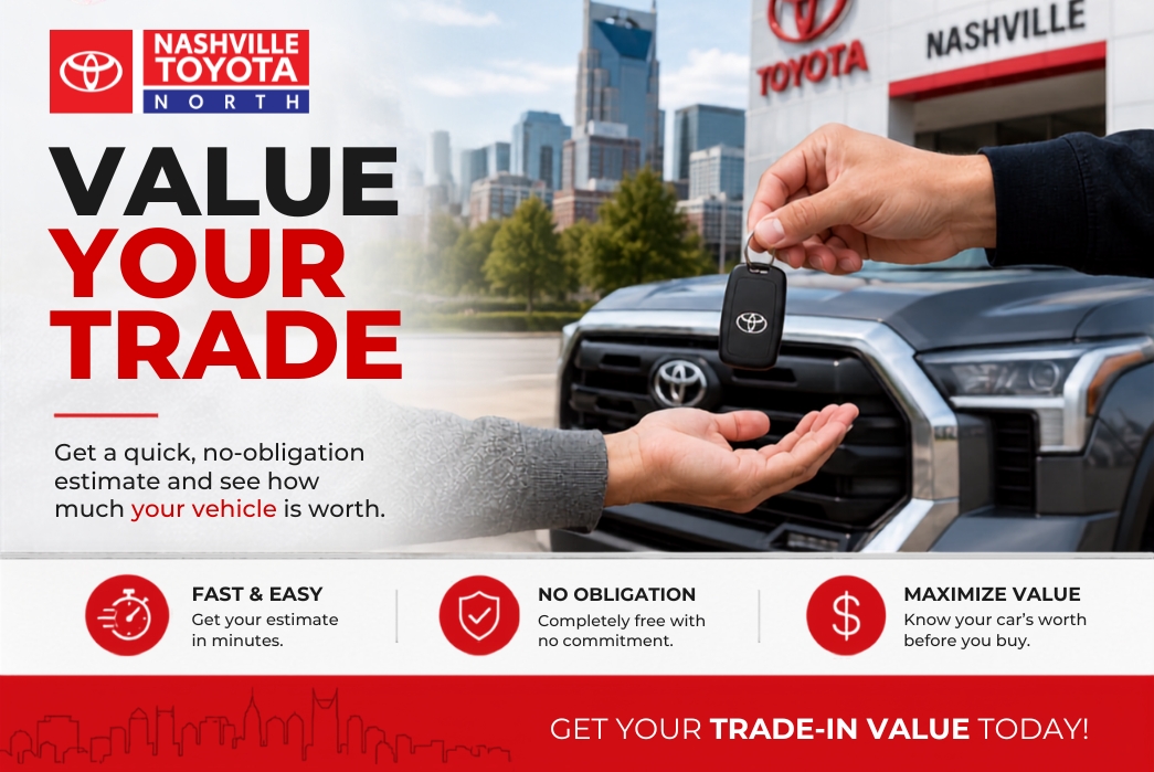 A hand is handing over car keys with a Toyota logo to another person's open hand, with a Toyota dealership and Nashville skyline in the background.